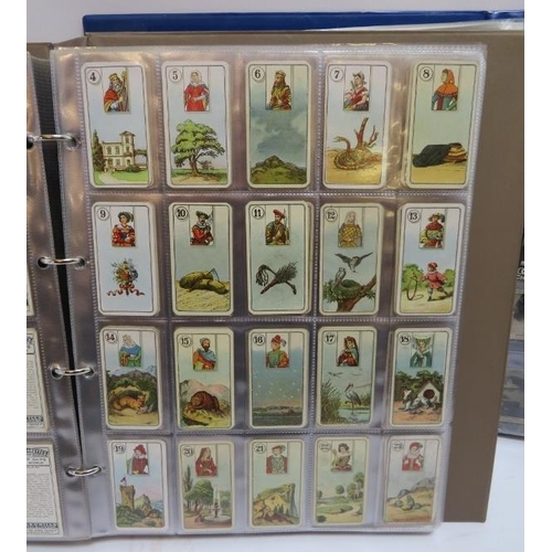 184 - A large collection of cigarette cards in two volumes, late Victorian period and later. Makers includ... 