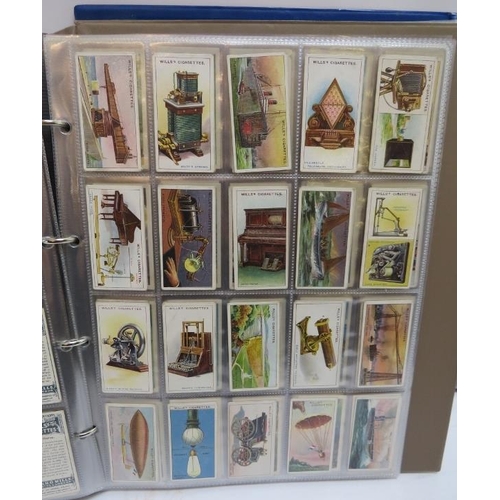 184 - A large collection of cigarette cards in two volumes, late Victorian period and later. Makers includ... 