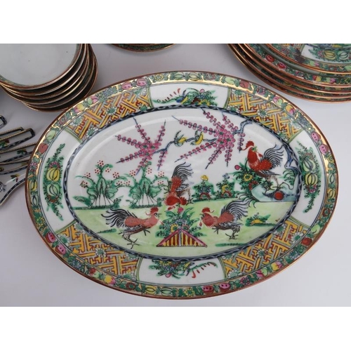 191 - A Chinese part dinner service, 20th century. Decorated in overglaze polychrome enamels depicting chi... 