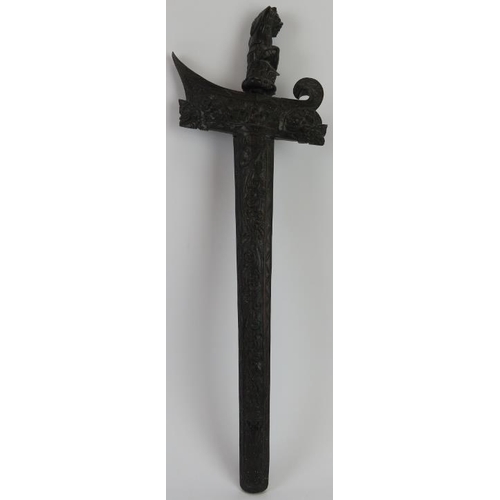 197 - A Japanese ceremonial carved hardwood Kris dagger. Carved with a figural handle and ornately carved ... 