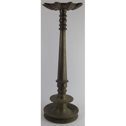 208 - An Indian bronze floor standing temple 'Puja' oil lamp with nine wick diya reservoir, 19th century. ... 