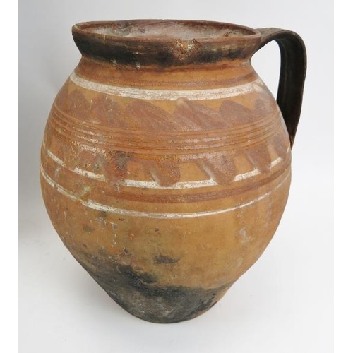 214 - Three antique Mediterranean pottery wares. Comprising a large ceramic vase together with two terraco... 