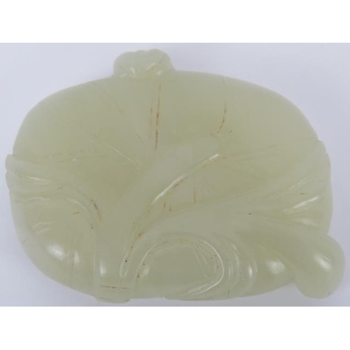 224 - A Chinese pale celadon jade brush washer cup, early 20th century. Carved in the form of a furled lot... 