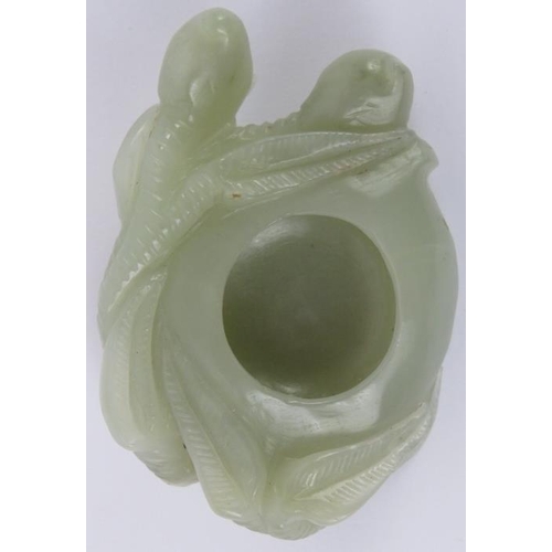 225 - A Chinese pale celadon jade brush washer cup, 20th century. Carved in the form of a simplified lotus... 