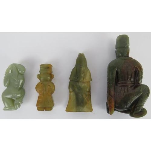 227 - A group of four Chinese celadon and russet jade figural carvings, 20th century. (4 items) Depicting ... 