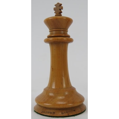 23 - A Victorian Jaques & Son of London turned ebony and boxwood weighted chess set entitled ‘The Staunto... 