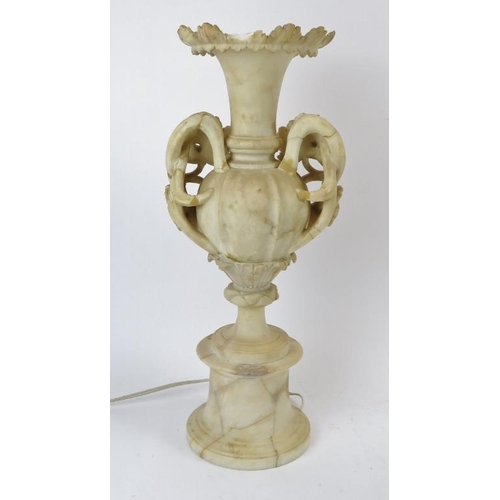 238 - A large alabaster illuminated urn table lamp. 49.8 cm height. Condition report: Some wear chips and ... 