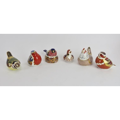 251 - A group of six Royal Crown Derby porcelain paperweight bird figurines. (6 items) Hen: cm height. 7.8... 