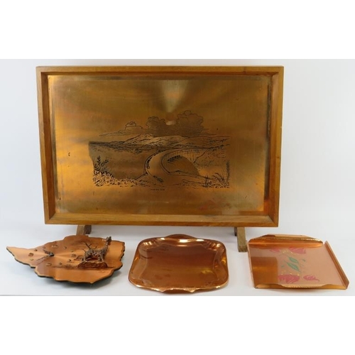 253 - A group of vintage African Zimbabwe copper items, mid/late 20th century. Comprising a screen depicti... 