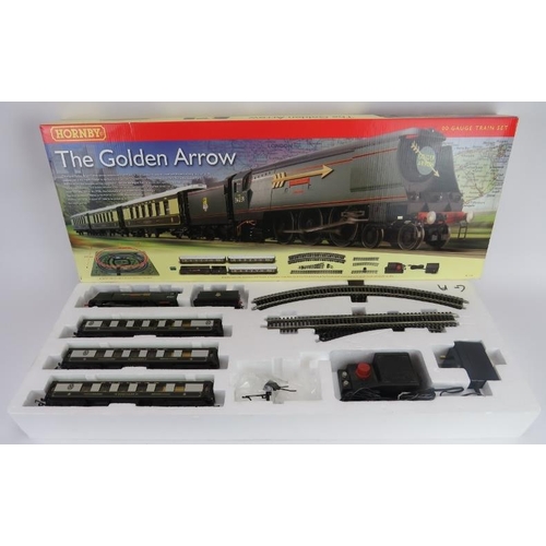 258 - A Hornby OO Gauge Golden Arrow Train Set. Boxed (R1119 set). Comprising a Golden Arrow steam locomot... 