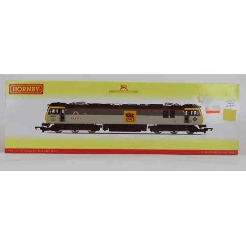 263 - A group of Hornby OO Gauge locomotives and related items. Comprising an OO Gauge EWS Co-Co Class 92 ... 