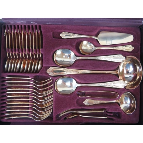 27 - An SBS Bestecke Solingen 23/24 Carat gold plated metal twelve place setting flatware set, late 20th ... 