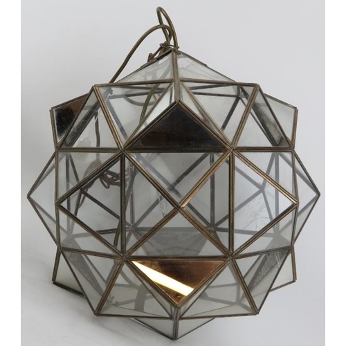 295 - A large multifaceted glass polyhedron ceiling light, 20th century. Composed of clear and mirrored tr... 