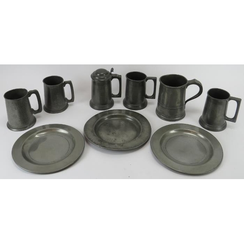 297 - A group of pewter tankards and plates, 18th/19th century. (9 items) Tallest tankard: 16 cm height. 
... 