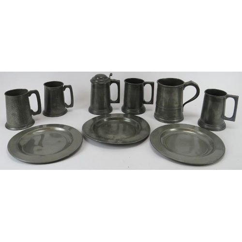 297 - A group of pewter tankards and plates, 18th/19th century. (9 items) Tallest tankard: 16 cm height. 
... 