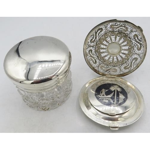 308 - An Iranian Niello & filigree compact with Niello sailing boat on the reverse and inside, 'Abadan 194... 