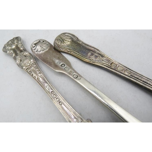 309 - Two Georgian silver teaspoons, a Victorian silver teaspoon and an Elizabeth II silver commemorative ... 