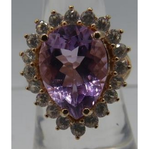 319 - Large pear cut amethyst cocktail ring. Overall portrait setting 23 x 18mm. Size N/O. 14k rose gold o... 