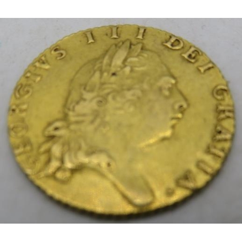 383 - A George III gold half spade Guinea 1798.
Condition report: Some age related wear.