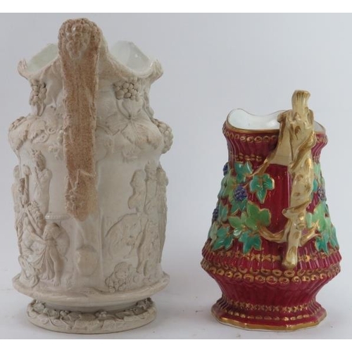 4 - Two Victorian relief moulded jugs, 19th century. Comprising a large Charles Meigh relief moulded 'Ba... 