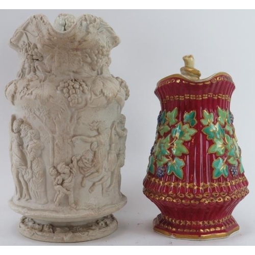 4 - Two Victorian relief moulded jugs, 19th century. Comprising a large Charles Meigh relief moulded 'Ba... 