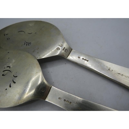 402 - A pair of Georg Jensen silver pyramid pattern fish servers decorated with dolphins. Marked 925. 8 tr... 