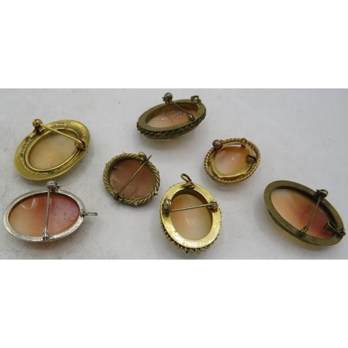 412 - A collection of 7 mainly vintage Cameo brooches/pendants, to include one with seed pearls.
Condition... 