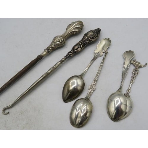 420 - Two silver handled button hooks with original box of boot buttons, a thimble and four various silver... 