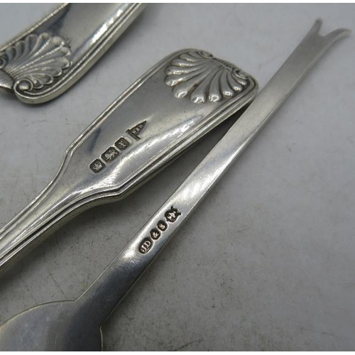 446 - A pair of silver Walker & Hall soup spoons with shell decoration, Sheffield 1913, and a pair of plat... 