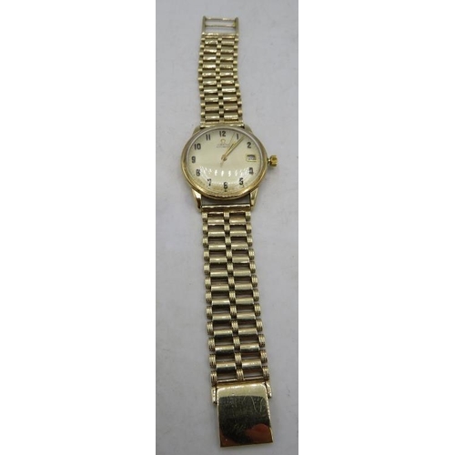 459 - An Omega automatic gold watch and strap, 161/25418. London 1968. The strap London 1956. Total weight... 