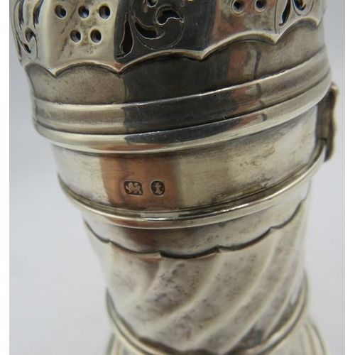 473 - A large silver caster with fluted decoration and locking devise, Birmingham 1893. Approx 7