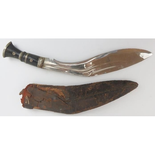 53 - A kukri knife, late 19th/early 20th century. With a horn handle and leather scabbard. Probably used ... 