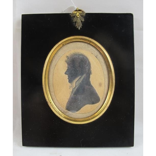 597 - British School (19th century) - 'Portrait of a Gentleman', silhouette miniature, 6cm x 5cm oval, ins... 