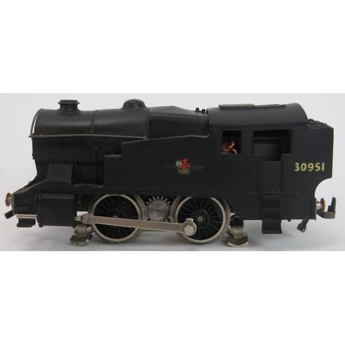 67 - A Trix Twin Railways three rail train set. Items include a OO Gauge 3 Rail Locomotive No. 30951 in B... 