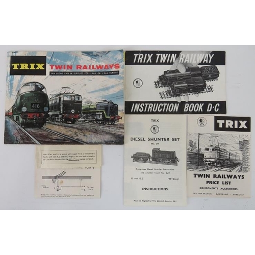 67 - A Trix Twin Railways three rail train set. Items include a OO Gauge 3 Rail Locomotive No. 30951 in B... 