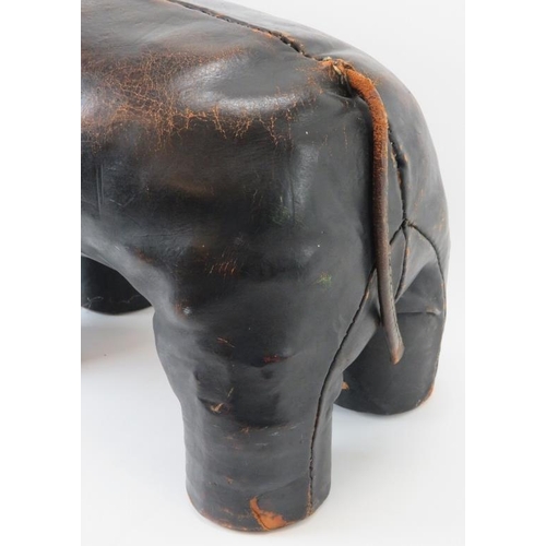 71 - A stitched brown leather straw stuffed elephant foot stool modelled in the manner of examples by Lib... 