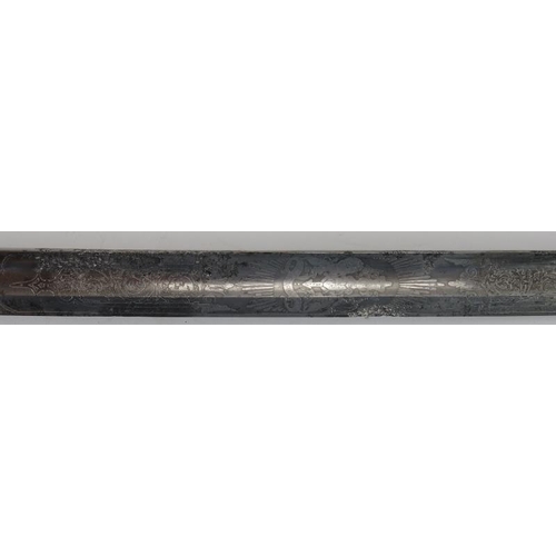 73 - A Royal Naval Officers boarding sword, 19th century. With a wire bound shagreen handle grip and fold... 