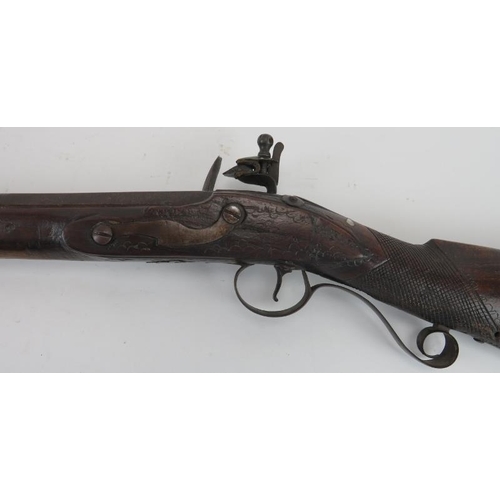 75 - An English East India Company oak and steel barrelled flintlock blunderbuss by Memory, late 18th cen... 