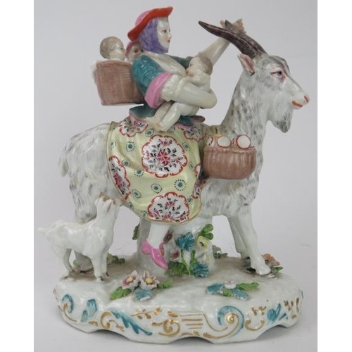 84 - A European porcelain figural group of The Welsh Tailor's Wife riding a goat with her young, late 19t... 