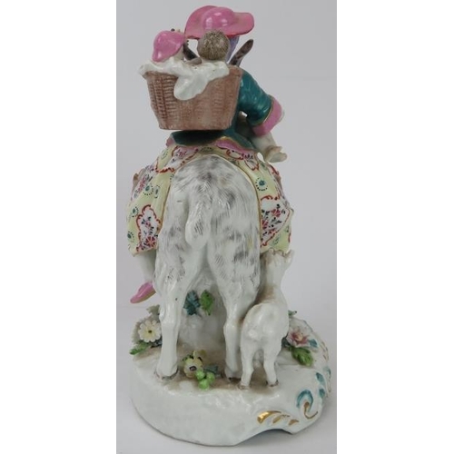 84 - A European porcelain figural group of The Welsh Tailor's Wife riding a goat with her young, late 19t... 