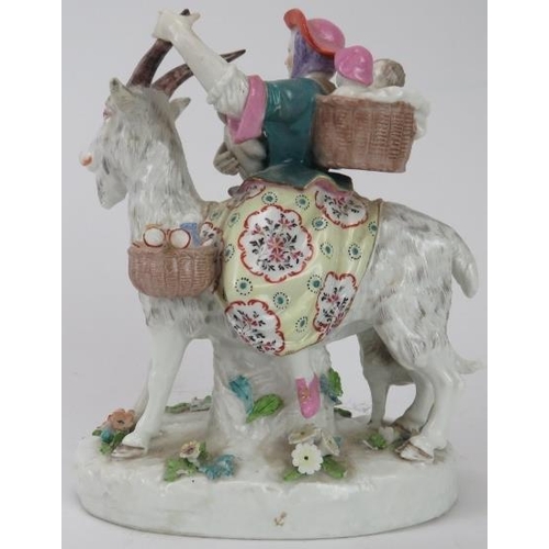 84 - A European porcelain figural group of The Welsh Tailor's Wife riding a goat with her young, late 19t... 