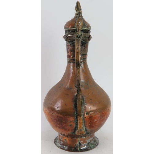 99 - A Middle Eastern mixed metalwork Dallah coffee pot, 19th century. 33.5 cm height. 
Condition report:... 