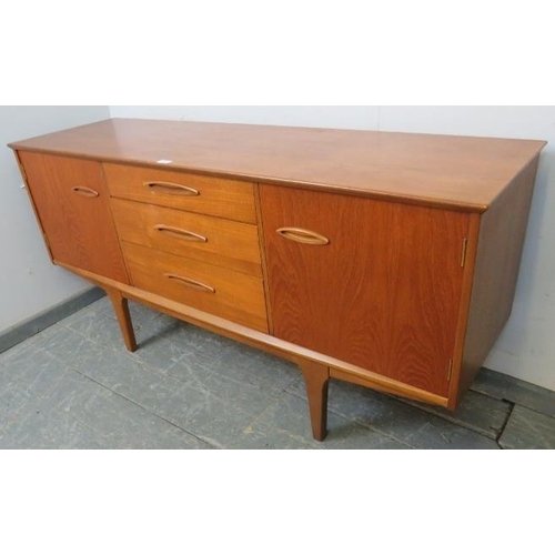 704 - A mid-century teak sideboard by Jentique, having three short drawers flanked by two cupboards with f... 