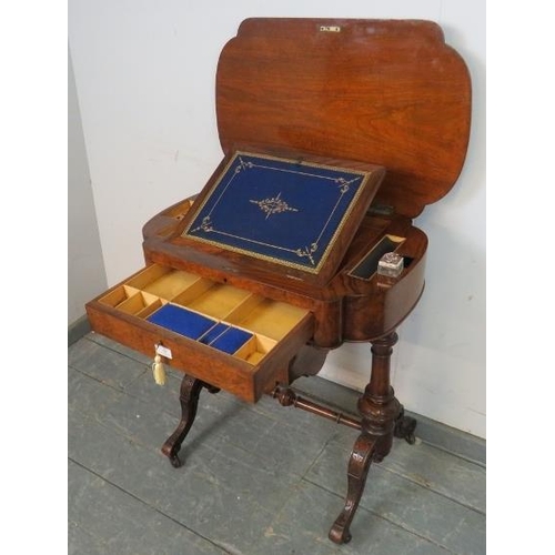 709 - A 19th century burr walnut writing table by Marvin cabinet makers, London, the lid opening onto a fi... 