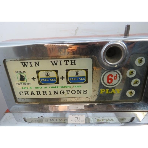 711 - A vintage Charrington’s themed chromed one-armed bandit mechanical slot machine by Bell Fruit. Inclu... 