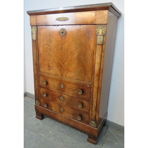 716 - A 19th century French Empire walnut escritoire with black marble loose top, having ornate gilt brass... 