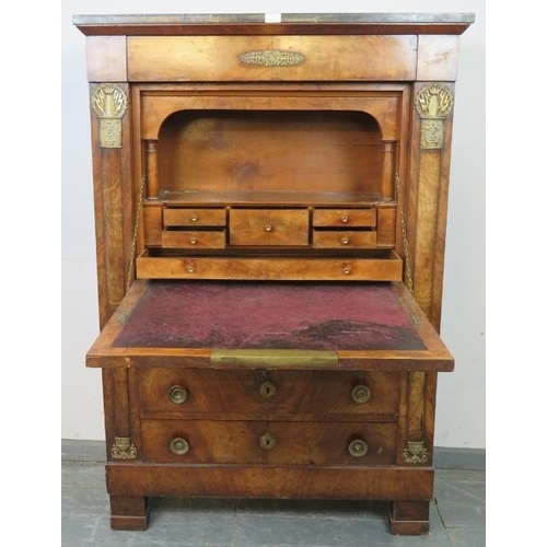 716 - A 19th century French Empire walnut escritoire with black marble loose top, having ornate gilt brass... 