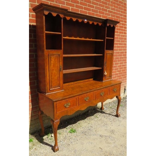 719 - A good quality Georgian style burr elm dresser, the top section with dentil cornice and shaped canop... 