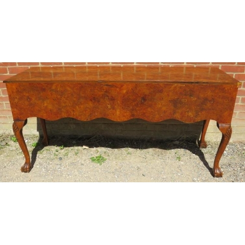 719 - A good quality Georgian style burr elm dresser, the top section with dentil cornice and shaped canop... 