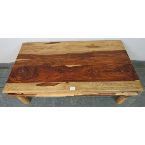 721 - An Eastern Jali wood rectangular coffee table, with metal bound corners, on turned supports. 
H40 W1... 